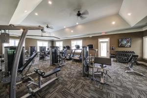 a fitness room with treadmills and machines at Landing Beautiful 3BD Clubhouse Pool in Greer