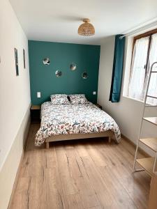 Giường trong phòng chung tại Gite 2 au coeur de la nature