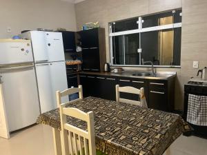 Køkken eller tekøkken på Casa temporada