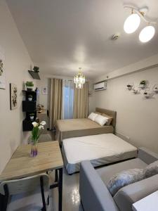 Postel nebo postele na pokoji v ubytování Saekyung Village Condominium Phase 301