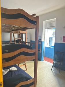 Postel nebo postele na pokoji v ubytování Hostel Barra