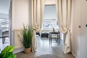 Postel nebo postele na pokoji v ubytování L'Eden Appart, Fibre, Garage, Balcon, Calme et Cosy