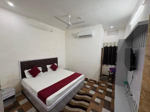 Giường trong phòng chung tại Ku residency