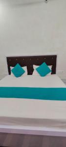 Giường trong phòng chung tại Ku residency +1 ảnh