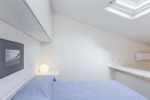 カポリーヴェリにあるI Chioppi 6 - Goelbaの白い部屋(ベッド1台、テレビ付)