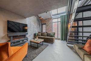 Et tv og/eller underholdning på Calm Sauna & Jacuzzi by OneApartments