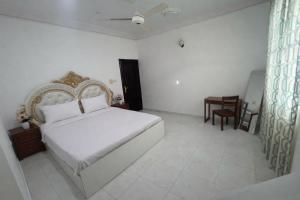 Tempat tidur dalam kamar di Amour Hostel