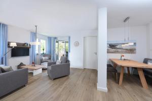 TV a/nebo společenská místnost v ubytování Ferienwohnung Sonnensegler