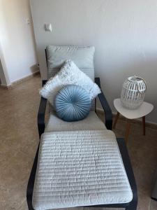 En eller flere senge i et værelse på Agua marina