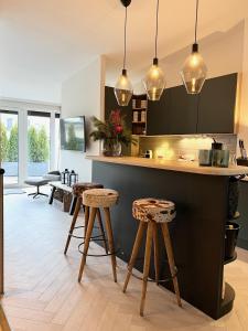 Kuchyň nebo kuchyňský kout v ubytování Penthouse Mountain and Lake View, terrace, AirCondition, incl Summer Card