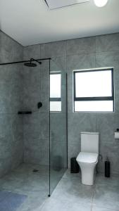 Et badeværelse på Mupauli Boutique Lodge