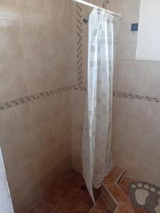 Et badeværelse på Hermosa casa a 15 min de Villa Carlos Paz