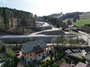 an aerial view of a house with a parking lot at Willa Marie in Krynica Zdrój