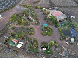 an aerial view of a miniature garden with a house at The Secret Garden Lanzarote in Haría
