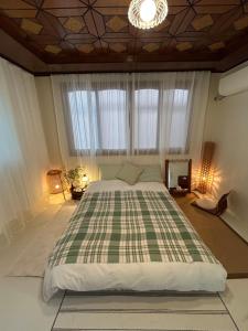 En eller flere senge i et værelse på Yulgokjip