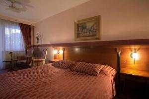 En eller flere senge i et værelse på Grand Hotel Residence Piešťany - boutique hotel + 30 billeder