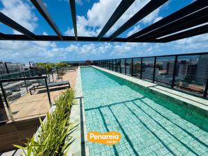 Swimmingpoolen hos eller tæt på EMUNAH DI CITTÀ Flats Ponta de Campina