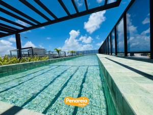 Swimmingpoolen hos eller tæt på EMUNAH DI CITTÀ Flats Ponta de Campina