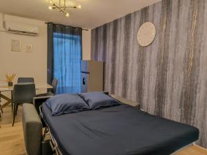 Postel nebo postele na pokoji v ubytování Le Celestya, confort au bord du rhône avec terrasse