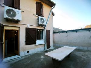 Balkón nebo terasa v ubytování Le Celestya, confort au bord du rhône avec terrasse