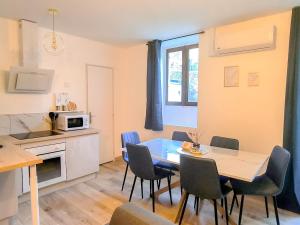 Kuchyň nebo kuchyňský kout v ubytování Le Celestya, confort au bord du rhône avec terrasse + 15 fotografií