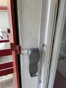 a door with a mailbox in the middle of it at Appartement Saint Genis Pouilly Cern in Saint-Genis-Pouilly