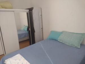 Postel nebo postele na pokoji v ubytování apto completo c garagem + 2 fotografie