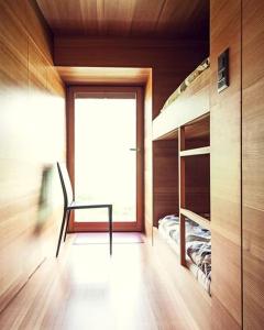 Postel nebo postele na pokoji v ubytování La Grange de Léonore - Maison de l'année, Valais