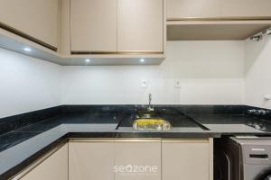 Køkken eller tekøkken på Aptos em prédio a 90 m da praia de Perequê - RIHs + 32 billeder