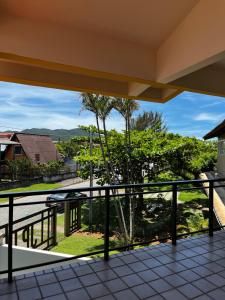 a view from the balcony of a house at A casa do sonho in Palhoça