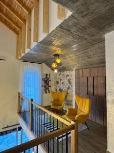 Posezení v ubytování De La Villa Brezovice