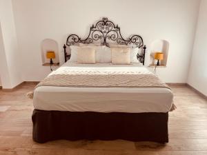 Giường trong phòng chung tại Dimora San Michele