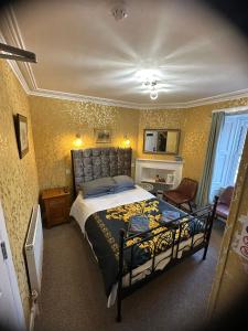 En eller flere senge i et værelse på IVY House