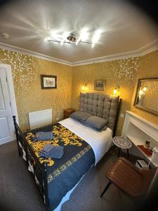 En eller flere senge i et værelse på IVY House