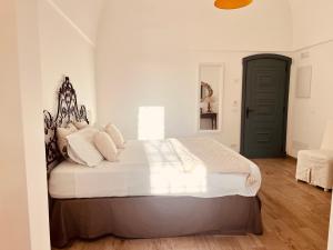 Giường trong phòng chung tại Dimora San Michele