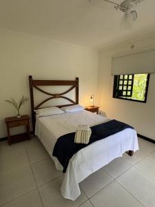 Postel nebo postele na pokoji v ubytování Pousada Recanto da Mata