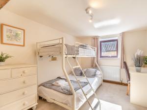 a bedroom with a bunk bed and a dresser at 2 Bed in Newton-on-Rawcliffe 88955 in Newton +14 photos