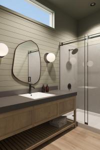 a bathroom with a sink and a mirror and a shower at Outbound Yosemite in Oakhurst +14 photos