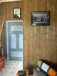 Et tv og/eller underholdning på Family Cabin With Charm