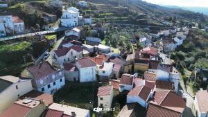an aerial view of a village with houses at Casinhas da aldeia-casa da xiquita in Seia