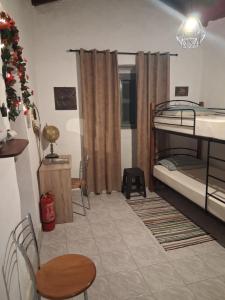 En eller flere senge i et værelse på Πέτρινο σπίτι-Stone house Kostas + 82 billeder