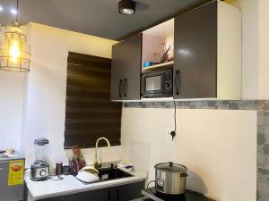 Køkken eller tekøkken på Apartment in Accra