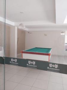 een pooltafel tentoongesteld in een kamer bij Refugio em Caldas Novas in Caldas Novas +8 foto's