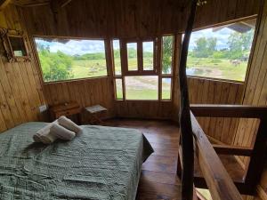 En eller flere senge i et værelse på Laureles Holístico + 88 billeder