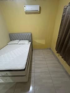 En eller flere senge i et værelse på casa em peroba