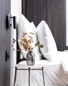 Postel nebo postele na pokoji v ubytování Erika's Apartments + 123 fotografií