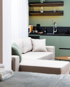 Kuchyň nebo kuchyňský kout v ubytování Erika's Apartments