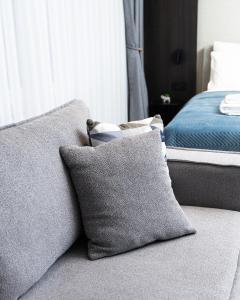 Postel nebo postele na pokoji v ubytování Erika's Apartments