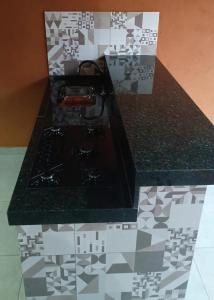 Køkken eller tekøkken på Suíte master vila geovana