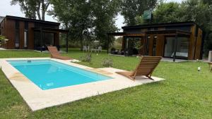 Swimmingpoolen hos eller tæt på Laguna y Tierra